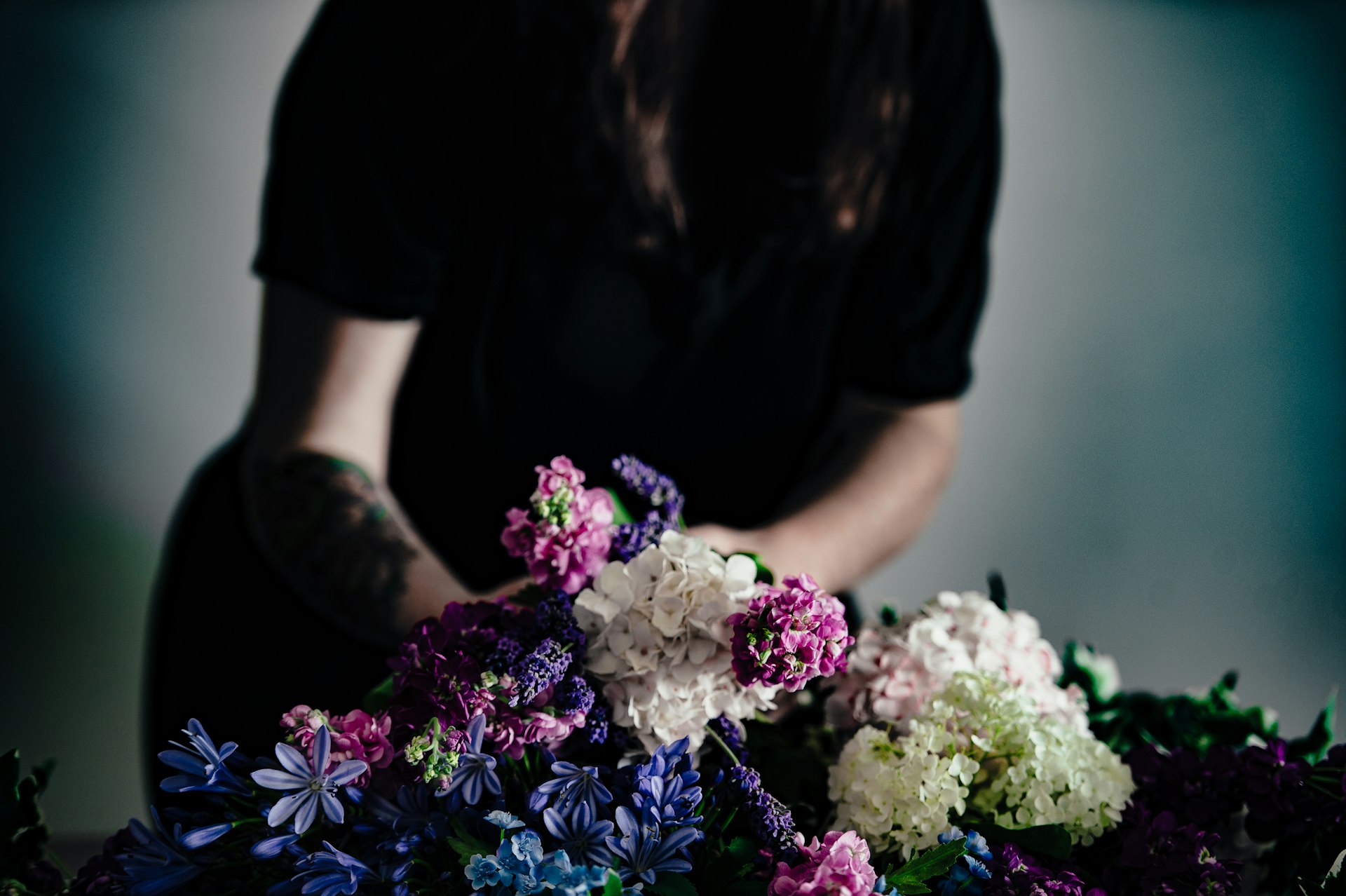 Florist arranging flowers